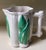 A carafe and glass set with textured reliefs designed by colin morrow, an international designer who was particularly...