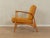 A wonderful armchair from the 1960s. High-quality cherry wood frame. The armchair has been reupholstered and covered with...