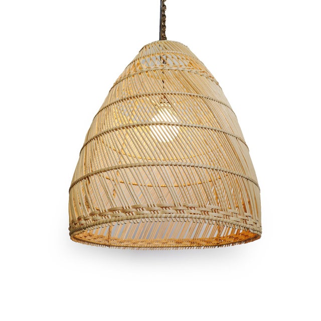Hand crafted woven wicker bell shaped basket lantern. Great indoors or outdoor under cover. Includes 3 ft of chain and...