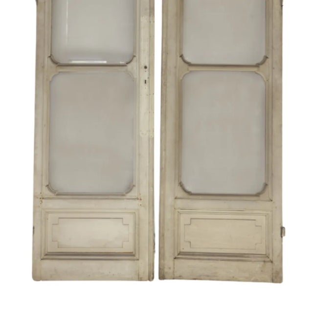 This exquisite set of four 18th-century French doors showcases the elegance and craftsmanship of the period, featuring...