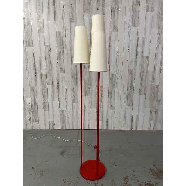 Very rare in the red color 1950s triple shade floor lamp designed by David Wurster for Raymor. The shades are new linen.