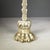 A 19th-century English brass doorstop shaped like a lion’s paw and ankle sitting on a hefty leaded base for weight and...