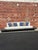 Black Stained Wood Front and End Tables, Oatmeal/Off White Upholstery. Original Mid Century. No makers mark or label. Sofa...