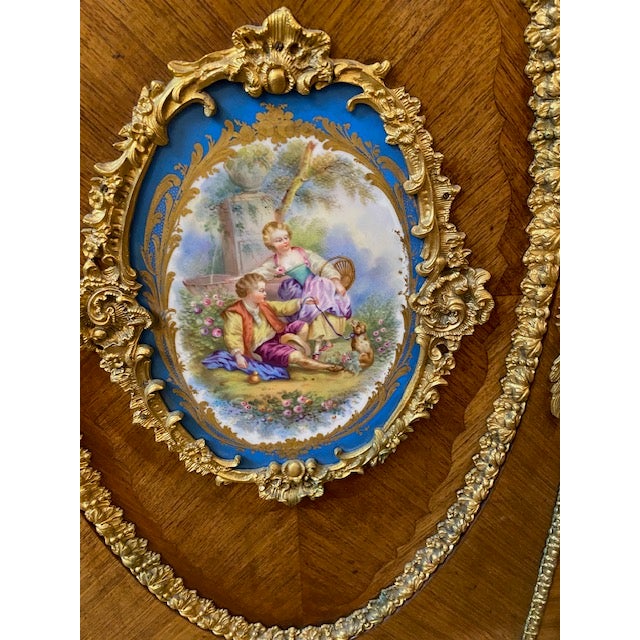 Antique French Veneered Chiffonier The top portion with shaped pediment and inset Paris porcelain plaque and mirrored back...