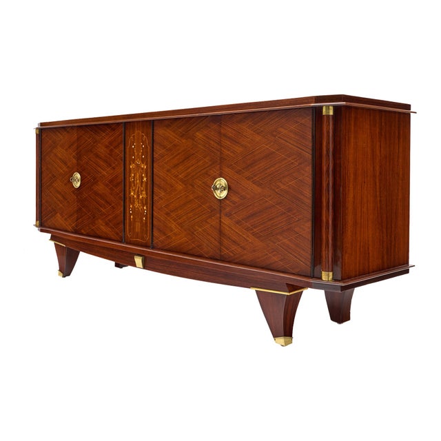 Buffet from the Art Deco period in France in the manner of André Arbus. This piece is made of solid wood construction with...