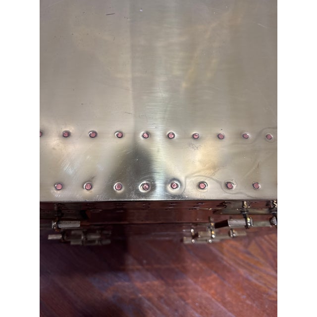 This is a stunning vintage brass clad nightstand or side table. The back is clad and finished as well so you could use...