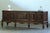 Large Danish sideboard crafted in dark stained oak, combining traditional cabinetmaking with clean architectural lines....