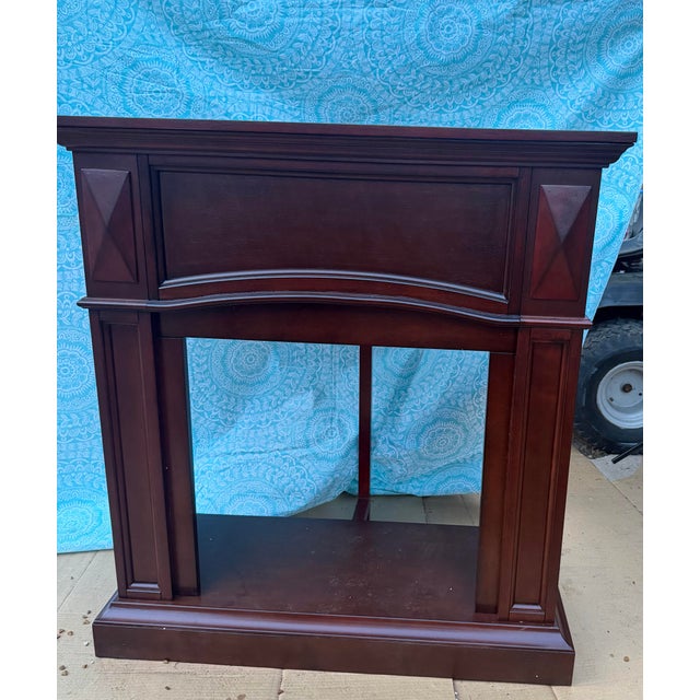 This is a Pleasant Hearth cherry wood, gas fireplace mantel. It will come to you unassembled, new in the box. Accessories...