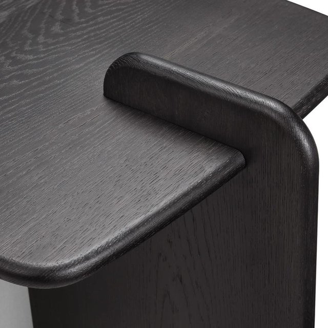 The Cards nightstand features a sculptural design inspired by a house of cards. Combining wood and metal, it presents...