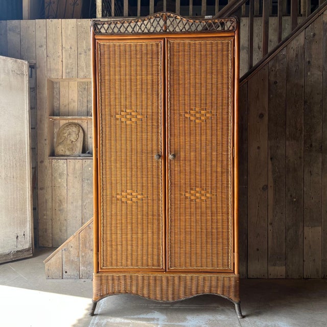 Vintage Wicker and bamboo Wardrobe The wardrobe has hanging space ,Wicker covers the top, front and sides . Inside the...