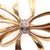 14 Karat Two Tone Yellow and White Gold Bow Brooch with Diamond Accents 0.04 total diamond weight. 4.89 grams total weight.