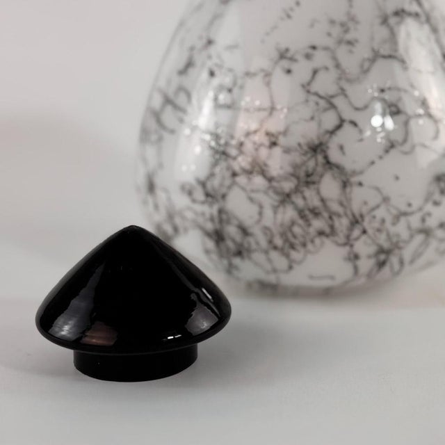 "if you ever feel like your lighting is missing a sharp edge, this one literally has it covered. murano glass table lamp...