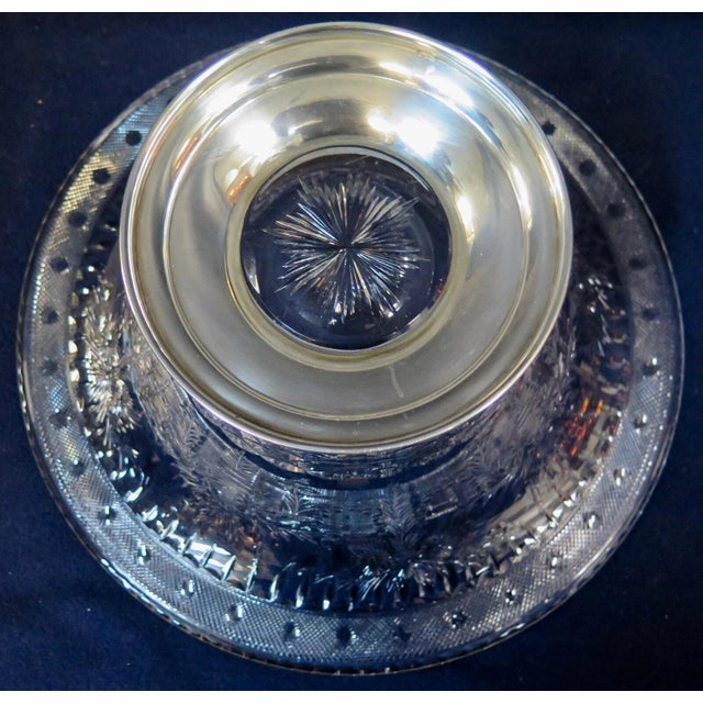 This vintage late 19th century American crystal/sterling silver bowl is signed HAWKES. The beautifully gleaming crystal is...