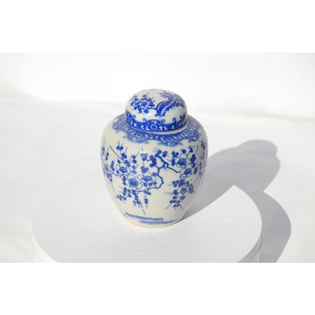 Small late 20th century ginger jar with lid and interior plastic cover. No damage.