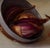 Realism Spilled Shallots by Michael DeVore | Oil on panel Still life of shallots in a bowl For Sale - Image 3 of 4