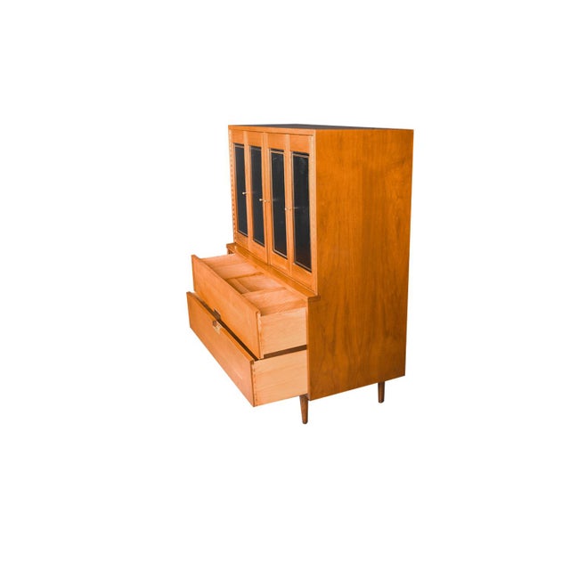 This exceedingly well-crafted American of Martinsville highboy dresser was designed by Merton Gershun for American of...