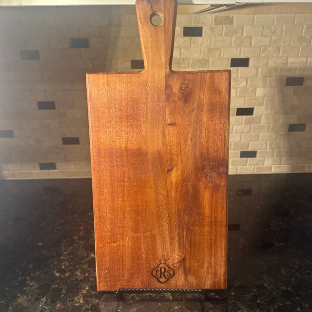 Preowned and used with monogramming cutting board. Great for farmhouse or rustic use. It does have some scratches and...