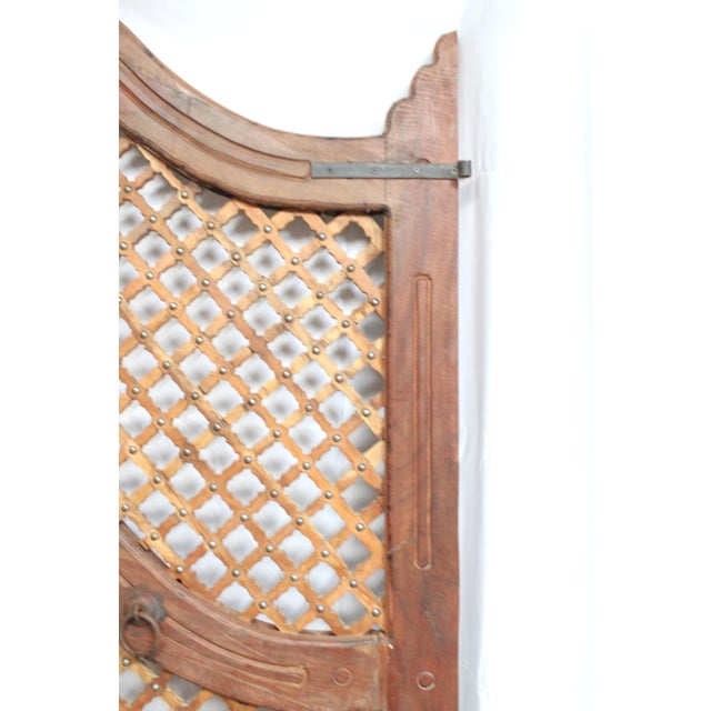 We like to call these our Mountain-top lattice gates. Each gate panel rises in a gentle mountain-like slope. Outside...