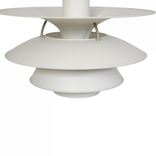 Poul henningsen ph5/4 charlottenborg lamp with white metal shades. The lamp is from the 1990s and appears in good...