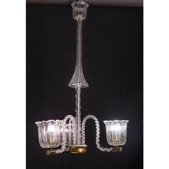 Elegant chandelier attributed to Ercole Barovier. 1940s period. A stupendous work in glass, the 3 cups and the rosette...