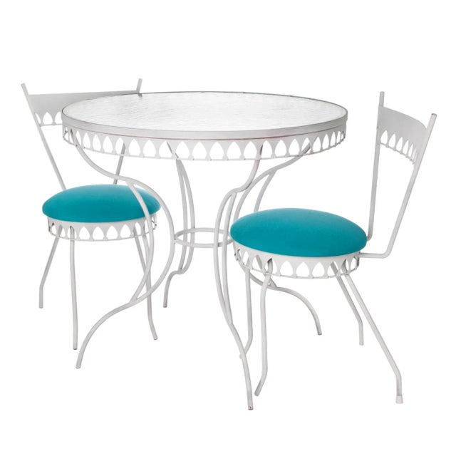 Striking Moorish style Mid-Century 3 piece cafe set in off white. Perfect for a balcony or other small spaces. The set...