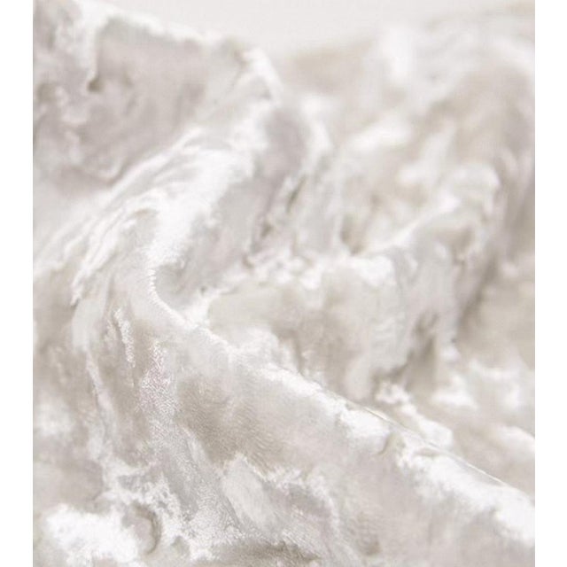 This pillow, crafted from its unique silver-white gradient fabric, presents a visual texture akin to solidified cream. Its...