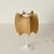 Stunning and truly unique floral cocoon table lamp with a metal and brass structure. This delightful piece was designed by...