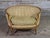 Late 19th Century French Giltwood Petite Settee with Guilloche Carving and Fluted Tapered Legs. Beautiful piece purchased...