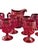 This L.E. Smith pitcher and cup set is a wonderful ruby red shade in the Moon and Stars pattern. There are a couple minor...