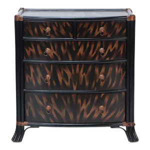 A Maitland Smith Ebonized Five Drawer Bow Front Commode Having Exotic Flame Painted Decoration and Leather Wrapped Trim.