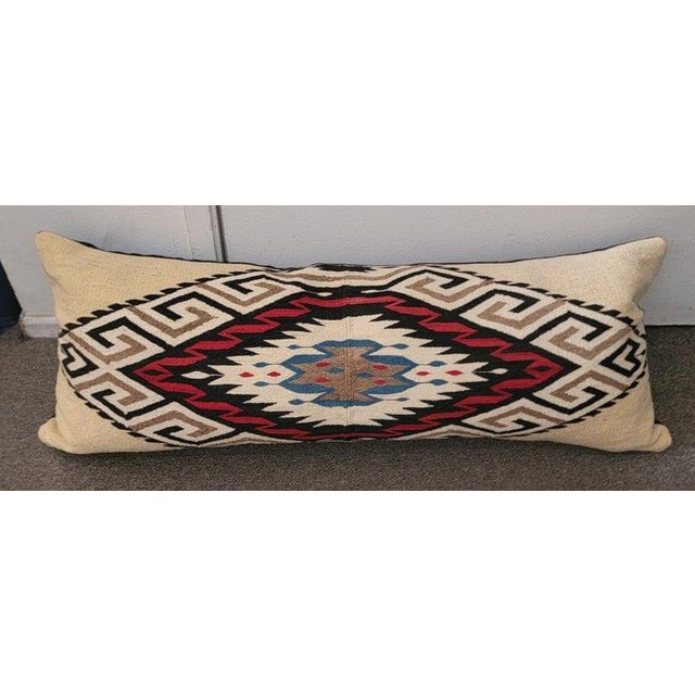 Mexican Indian Weaving bolster pillow with black linen backing. Custom made down and feather insert.