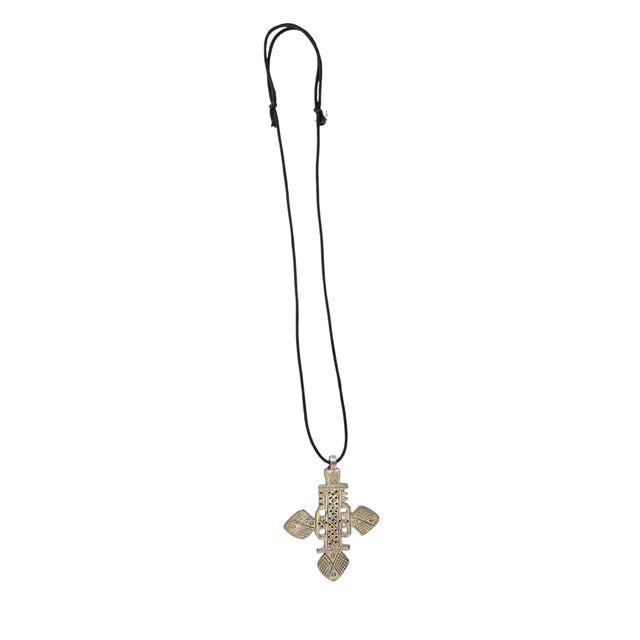 An Ethiopian silver cross is a highly intricate, hand-crafted Christian symbol, often called an Abyssinian or Coptic...