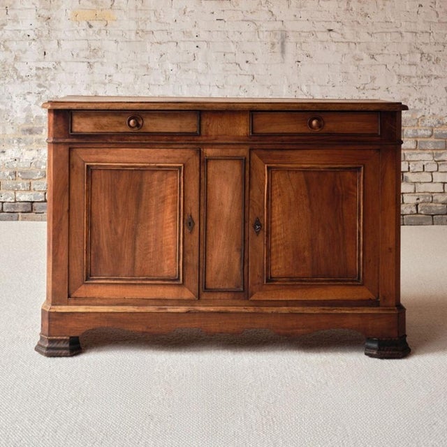 Add timeless French elegance and functionality to your space with this 19th century French Louis Philippe walnut server, a...