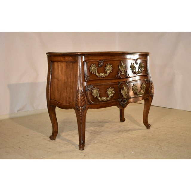 Superb quality 18th century period Louis XV two drawer commode. The top has scalloped and shaped edges, which are beveled...