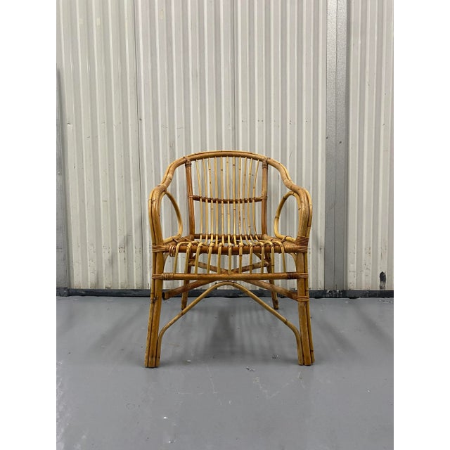 Mid-Century Modern Bamboo and Rattan Armchair. Beautiful fun hand crafted piece with unique bent rounded bamboo...
