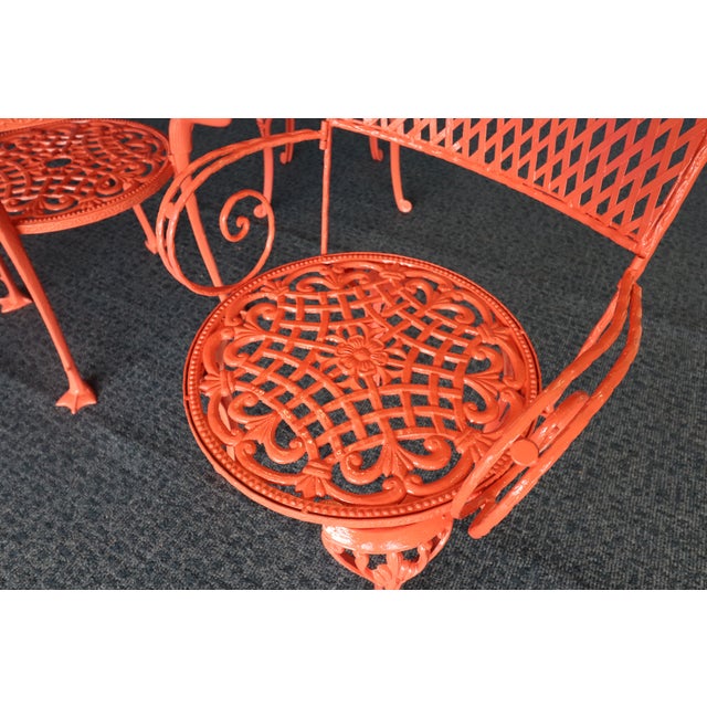 Transport your outdoor space to a golden era of tropical elegance with this 1950s wrought iron patio set, a true...