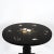Traditional oval pietra dura table top of black marble inlaid with naturally colored stone creating a bouquet of yellow...