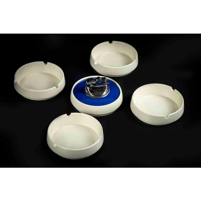 Pyramidal smoking set is an original decorative object realized in Germany in the 1970s. A unique object composed by four...