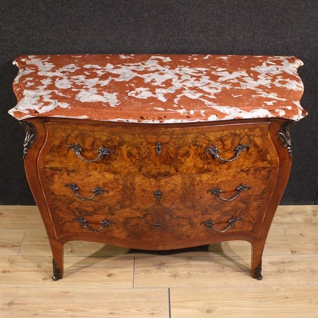 An elegant mid-20th-century Italian dresser. A commode of excellent quality, in the Lombard Louis XV style, finely inlaid...