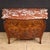 An elegant mid-20th-century Italian dresser. A commode of excellent quality, in the Lombard Louis XV style, finely inlaid...