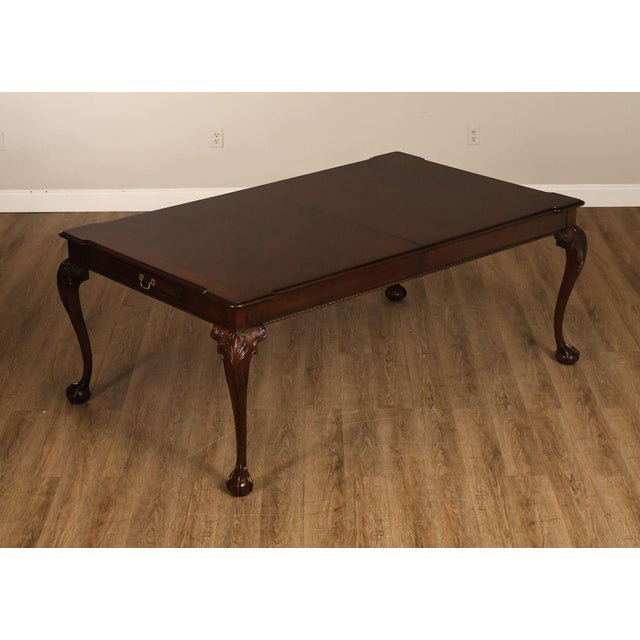 High Quality American Made Mahogany Extendable Dining Table with Carved Ball and Claw Feet and Dovetailed Drawer on Either...