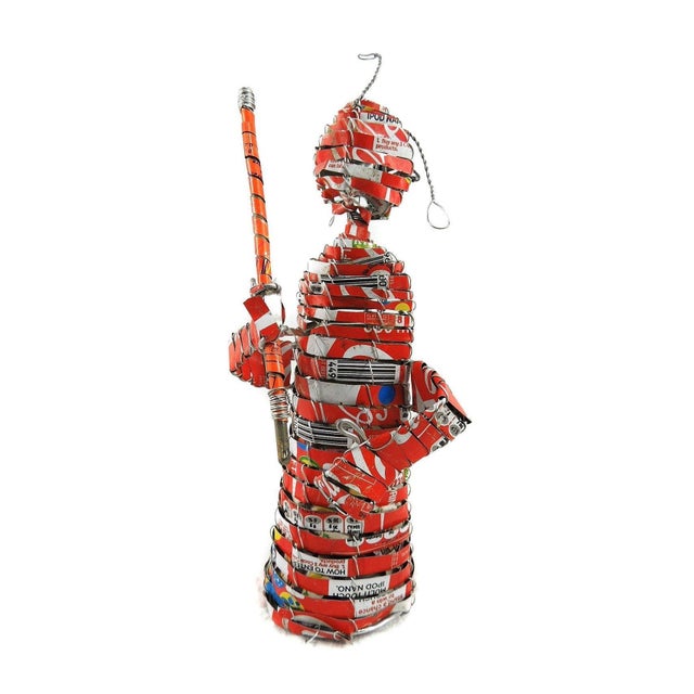 These figures are made from recycled materials including sheets from cans and wire. They are handmade by nknown artists in...