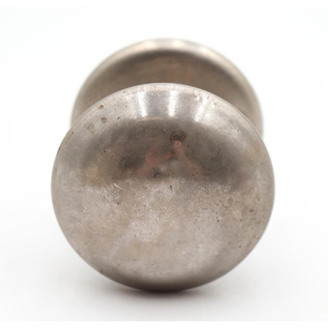 Modern style dummy door knob set with a brushed steel knob and an aluminum rosette. The original mounting screws are not...