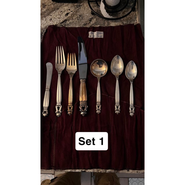 1920’s vintage Georg Jensen sterling silver flatware sets. 7 pieces per set including fabric placeholders. Total of 14...