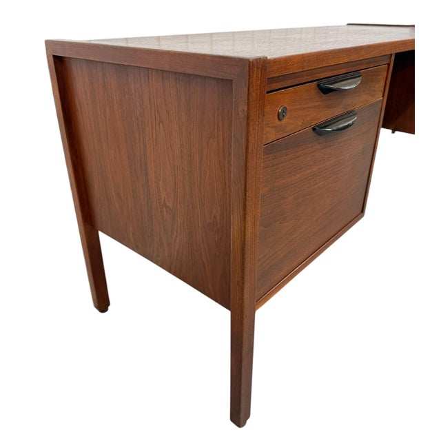 Elevate your workspace with this 1960s Mid-Century Modern walnut writing desk signed by Jens Risom. Expertly refinished,...