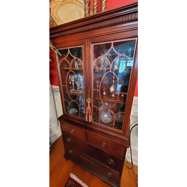 Beautiful, high-quality traditional wood hutch / China cabinet in excellent condition. This classic piece features a rich,...