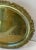 Beautiful brass serving tray with n nice outside trim details and footed on the bottom.