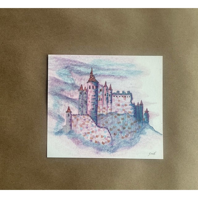 A charming, softly rendered fantasy castle emerges from a misty, pastel sky in this delicate colored pencil hand-drawn...