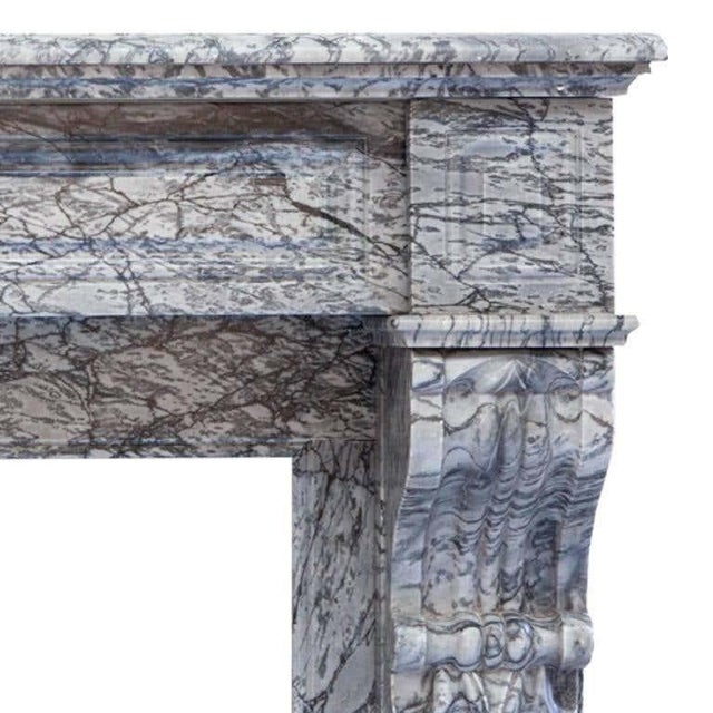 19th century antique french, louis philippe fireplace mantel. Hand carved in desirable italian bardiglio marble which is...
