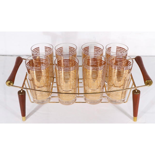 Classic Mid Century Hollywood Regency Colony Glass gold band glasses set, consisting of eight highball glasses with...